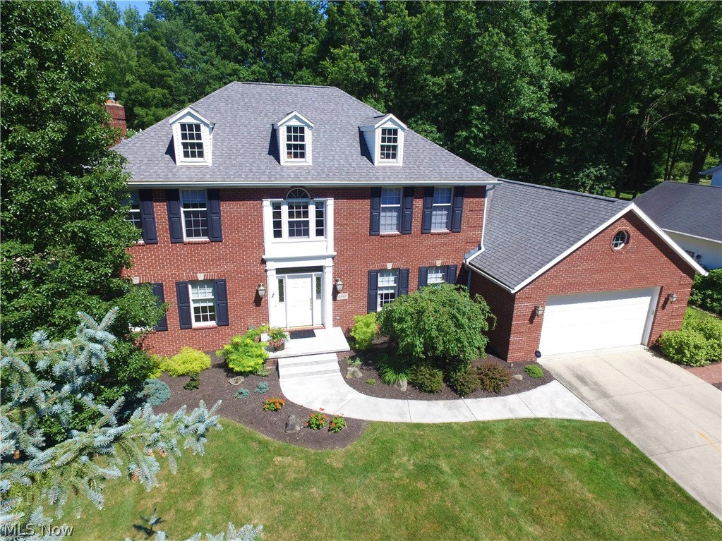 Wow...what a house! Classic, custom built colonial on quiet cul-de-sac boasts 4500+ square feet of immaculate & well-maintained living space! Featuring 5 Bedrooms & 4 Full Baths, this home must be seen to be appreciated! Custom details throughout! Formal Foyer w/ hardwood flooring welcomes you home. Huge Formal Dining Room is perfect for family holidays & entertaining! Formal Living Room connects to the Family Room. Enormous, eat-in Farmhouse Kitchen is fully applianced & offers a center island, corner pantry,
hardwood flooring, solid surface counters, ceramic tile back splash & a convenient desk area.  Large Family Room w/ brick fireplace opens to the relaxing Sun Room w/vaulted, wood plank ceiling. 1st floor office (could be BR #5), full bath, Laundry Room & Mud Room complete the main floor. Upstairs, you will discover a huge Master Suite that includes a 7 X 12 walk-in closet and an updated bath with split vanities, corner shower and jetted tub. 3 additional bedrooms offer abundant