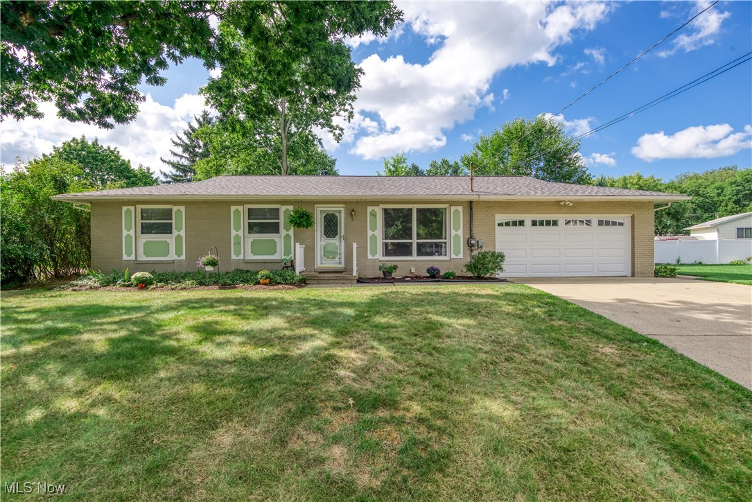 This lovely ranch style home is nestled in a cul-de-sac setting and located close to everything!  This most popular floor plan features a spacious living room with large picture window, super nice kitchen with an abundance of cabinetry, tile backsplash, all appliances, built-in desk and welcoming dining area and three bedrooms including an owner's bedroom with adjacent half bath.  New carpet and paint throughout, new roof (2022), water heater (2019), furnace and central air conditioning (2018), garage door (2020).  Two car attached garage, full basement with rec room and plenty of storage space, beautiful backyard.  Nothing to do here but just move in!