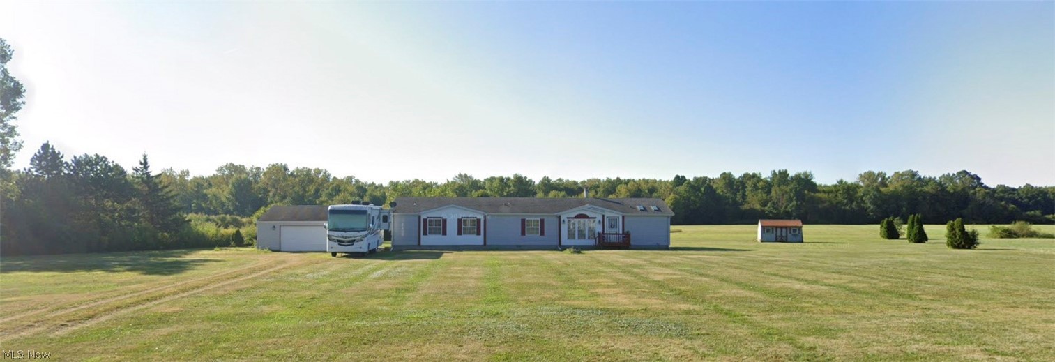 Welcome to your own slice of country paradise and discover the possibilities on 8.54 beautiful acres! This spacious 4 bedroom, 3 bathroom ranch offers 2,052 sqft of comfortable living with endless opportunities to make it your own. Whether you envision hobby farming, creating walking trails, planting a large garden, adding a workshop, or simply enjoying peaceful evenings surrounded by nature, this property provides the space and freedom to bring your ideas to life.

Located just minutes from Oberlin College and charming downtown Oberlin, you'll enjoy the perfect balance of rural privacy and small-town convenience. Spend your weekends exploring local cafés, restaurants, unique shops, art galleries, farmers markets, concerts, and community events before returning home to your own private retreat.

The sellers are highly motivated and simply ask for flexibility while they secure their next home. If you're interested in any of the riding mowers, feel free to include them in your offer. The seller is willing to consider any reasonable offer for the equipment. Don't miss this rare opportunity to own acreage in a highly desirable location with room to grow, dream, and create lasting memories.

*BEING SOLD AS IS. 24 hours notice is required for scheduling showings.
