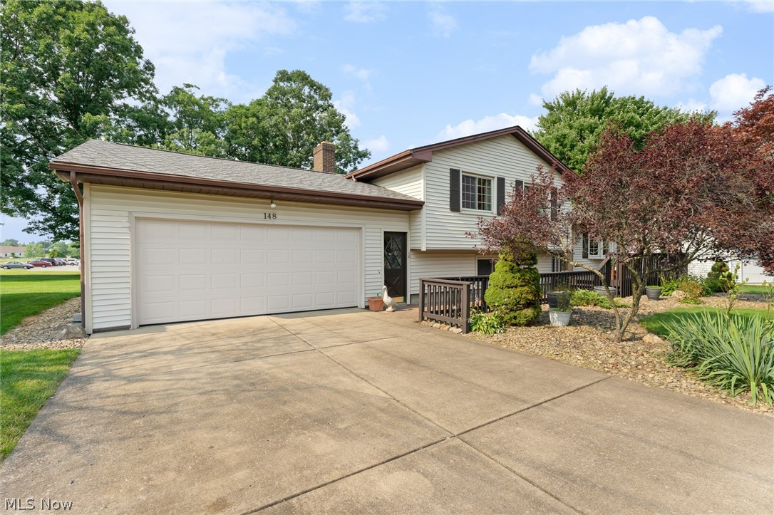 Remarkable three level split home with nice front porch, 2 car attached garage, rear deck and 16x16 storage shed with loft. Main floor plays host to large living room, eat in kitchen, great room with vaulted ceiling and half bath. Second floor has 3 bedroom and full bath. Lower level has direct access from garage, full bathroom, large family room with fireplace and direct access ti rear yard. Amazing school district and location.