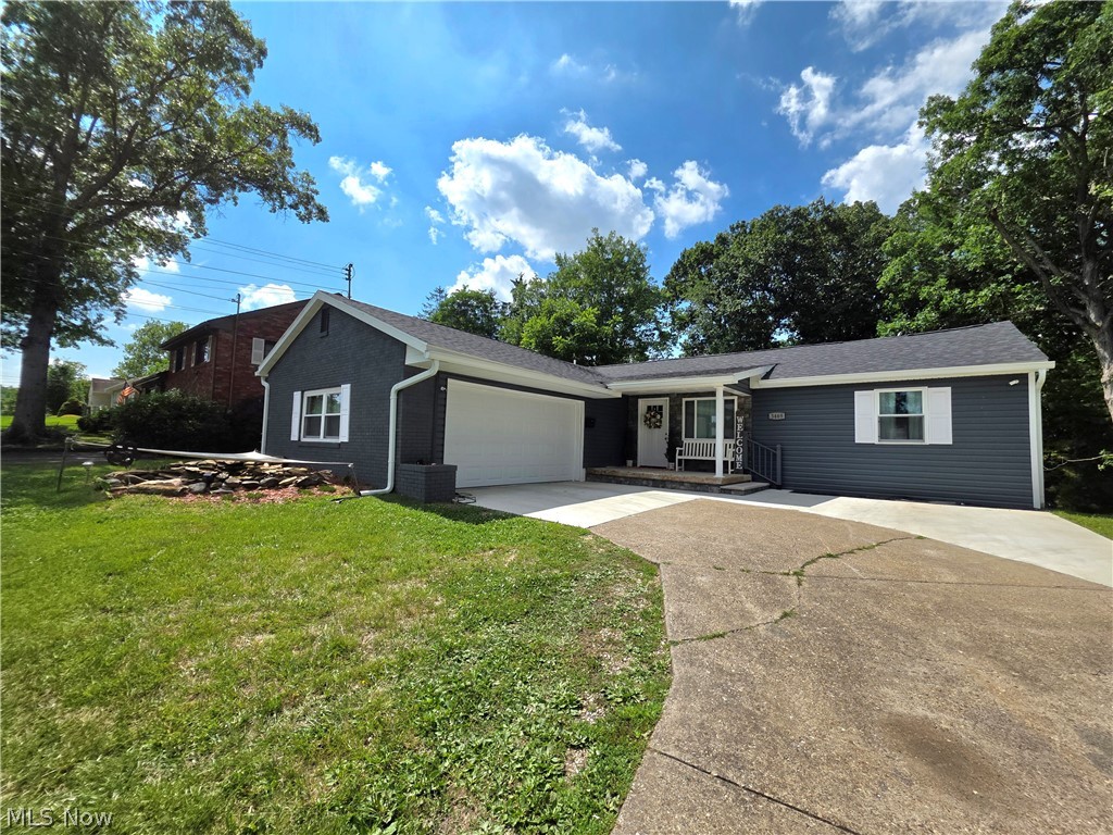 Completely Remodeled Down to the Studs – North End Parkersburg Gem!
Welcome to 3469 Roseland Avenue, a stunning 1954 home that has been fully transformed with a 100% down-to-the-studs remodel in 2025. Nestled in a sought-after North End neighborhood, this home sits directly across from the golf course, offering walkable access and picturesque views. This 3-bedroom, 2.5-bath home offers 1,940 square feet of thoughtfully designed open-concept living. The completely remodeled kitchen is a showstopper, featuring elegant quartz stone countertops and soft-close cabinetry throughout. The kitchen flows seamlessly into the living and dining areas, with plenty of room for a large dining table — perfect for entertaining or family gatherings. Cathedral ceilings add volume and light to the open living space.  Step outside to enjoy the full-length back deck plus a screened-in porch, ideal for relaxing evenings. The front yard features a charming 1,500-gallon koi pond, adding unique curb appeal you won't find anywhere else.
Every major system has been updated: new electrical, new PEX water lines, new windows, and a new roof — offering true peace of mind for years to come. The attached 2-car garage and extended driveway provide ample parking, and a backyard shed offers additional storage.
Situated on a 0.3085-acre lot in one of Parkersburg's most desirable areas, this move-in-ready home combines modern updates with timeless charm. Don't miss your chance to own a fully renovated home in this prime North End location — schedule your showing today!