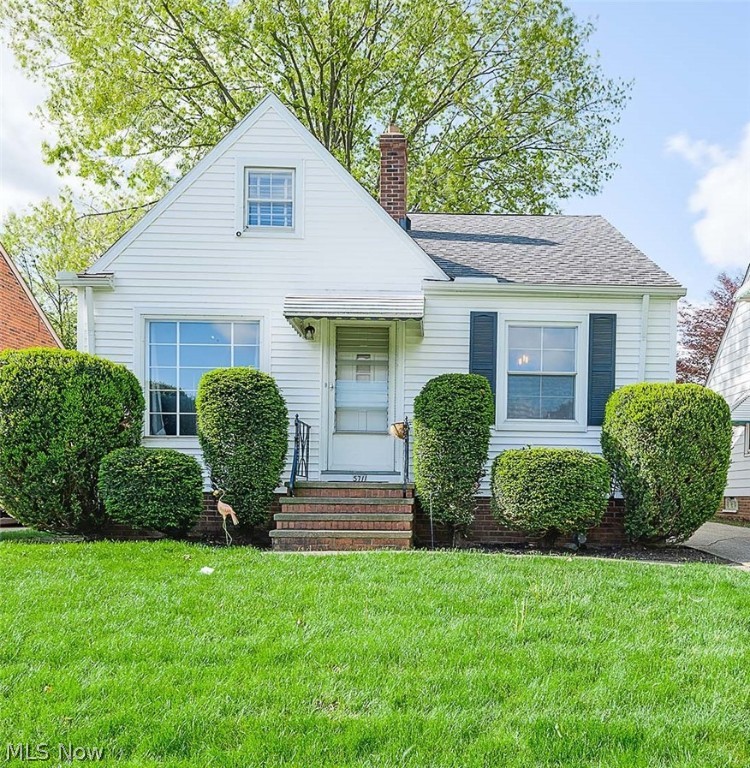 As you walk up to this Parma beauty you will notice the newer siding which was freshly installed in 2018. The home was also insulated at that time. A new roof was done in 2014. Plenty of light enters through many windows to show off the beautiful hardwood flooring and trim. The large living room and connecting dining room offer plenty of space for entertaining and conversation. The kitchen looks sharp with ebony countertops and a matching backsplash and includes additional, well-placed, countertop sections near the fridge and oven. There are plenty of base cabinets and cupboards for all of your kitchen storage needs, not to mention a newer faucet installed in 2020 and a new stove exhaust fan installed in 2021. The main bathroom is quaint with a large storage cabinet for towels and toiletries. Both first-floor bedrooms have closets and plenty of room for bedding, nightstands, and dressers. The partially finished basement is ready for your Rec room ideas including a 2nd full bathroom, ut