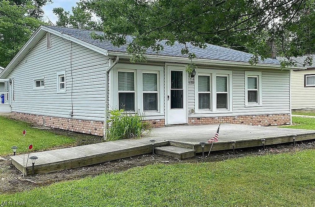 This charming 3-bedroom, 1-bathroom home is nestled in the heart of Aurora, Ohio! As you step inside, you'll be greeted by a spacious interior newer carpet and LVT throughout. The kitchen comes equipped with appliances, including a microwave, refrigerator, range/oven, garbage disposal, washer and dryer. The living area boasts a generous total interior livable area of 1,160 sqft, providing ample space for you and your loved ones to make cherished memories. Situated on a spacious lot of 0.47 Acres, this home offers plenty of room for outdoor activities and future expansion. Built in 1935, frame construction and a new reliable asphalt/shingle roof. Come and explore this delightful property today!