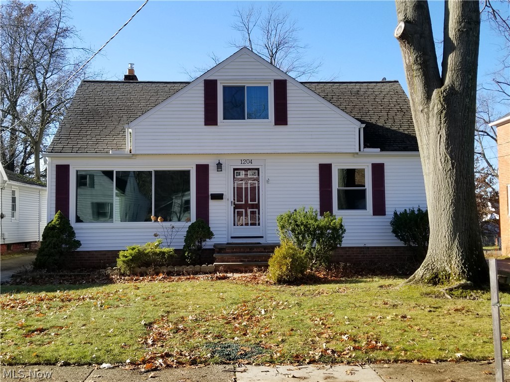 Welcome to this well maintained 2 bedroom bungalow. This home has been professionally painted and cleaned It's move in ready! There a spacious living room with large picture window. There is original hardwood floors throughout the living room and both bedrooms. There is unfinished second floor that could be finished to for additional living space. The is a sliding glass door leads to a 15x12 deck and 2 car garage. All appliances stay. Close to parks, shopping, dining, and highway. HOME WARRANTY INCLUDED!