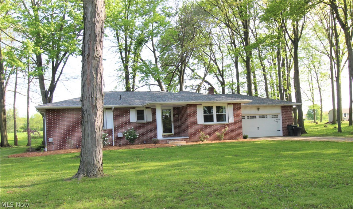Location, Location, Location!! This 3 BR, 3BA brick ranch with 2 car garage is situated on almost a half acre wooded lot on a cul-de-sac street just outside of Orrville.  Enjoy the peacefulness of the outside sitting on the covered back patio or around the firepit.  The interior offers a remodeled kitchen with solid surface Corian counter tops, stainless appliances, and tiled back splash.  Refinished original oak flooring through-out. Remodeled bath with subway tiled shower.  Newly added full master bath featuring a barn door.  Many more updates including roof, furnace, A/C, some windows, lighting, flooring, kitchen appliances, garage door, front door, water softener, aerator for septic, full bath added in basement and much more all in 2020-2022.  Plenty of room to finish the dry basement! 
 Plenty of storage in the 14 x 10 storage building with new roof and flooring.  Don't wait too long for this one!