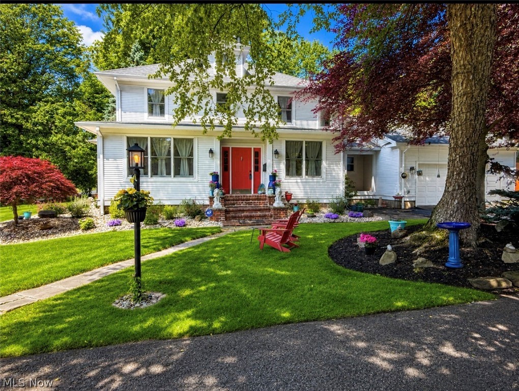 Welcome to this truly exceptional Poland residence, where timeless elegance and historic charm blend seamlessly with the conveniences of modern living. Situated on three lots totaling nearly 1.5 acres, this beautifully maintained home was originally built in 1921 and thoughtfully expanded in 1991, creating the perfect balance between classic character and contemporary updates. From the moment you step inside, you’ll be captivated by the home’s original craftsmanship, including gorgeous hardwood floors, exquisite trim and moldings, built-in china cabinets, vintage glass door knobs, and abundant natural light that fills every room. Renovated in 2020, this showcase property offers today’s most desirable amenities while preserving the architectural details that make it truly special. The stunning kitchen is the heart of the home, featuring white cabinetry, marble countertops, stainless steel appliances, and a large center island perfect for gathering with family and friends. The formal living room offers a cozy gas fireplace and sun-filled windows, while French doors lead to a private office. The spacious family room opens through sliders to a patio overlooking the picturesque grounds. Upstairs, you’ll find three generously sized bedrooms, including a spacious owner’s suite with an en-suite bath and an enormous walk-in closet. Closet space is abundant throughout the home. A walk-up third-floor attic provides endless possibilities for storage or future expansion. Outside, the property is just as impressive. Enjoy beautifully landscaped flower gardens, a privacy-fenced backyard, a charming gazebo, and a classic red barn that adds to the property’s storybook appeal. Located just a short walk from the scenic Poland Woods, restaurants, and shops, this one-of-a-kind home offers a rare opportunity to own a piece of local history while enjoying all the comforts of modern-day living. A truly remarkable property filled with character, warmth, and timeless beauty.
