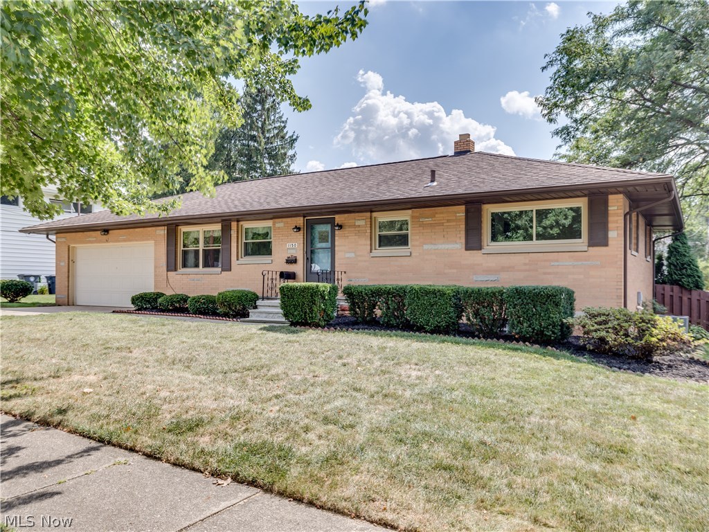 Phenomenal 2 bedroom, 2 bath brick ranch in the heart of West Akron nestled behind Stan Hywet Hall* This home has an attached 2 car garage with a fenced backyard with a covered porch and patio* After entering the foyer, you will see the light and bright spacious eat in kitchen with appliances (stainless steel refrig, range, oven), pantry, & ceiling fan with more than ample storage and counter space* Living room with wood like floors & Anderson windows looking over fenced backyard & access to covered porch & patio* Hallway to full bath and bedrooms has a large cedar closet* Master bedroom with wood floors & 2 cedar closets* 2nd bedroom with wood floors and cedar closet* Lower level has a finished rec room with glass block windows, full bath with new sink and utility/laundry room with washer & dryer* 2 car garage has nature stone floor, workbench area, storage & access to back yard* Roof approx. 8 yrs* Newer windows approx. 2009*  Interior has been professionally painted, including lower