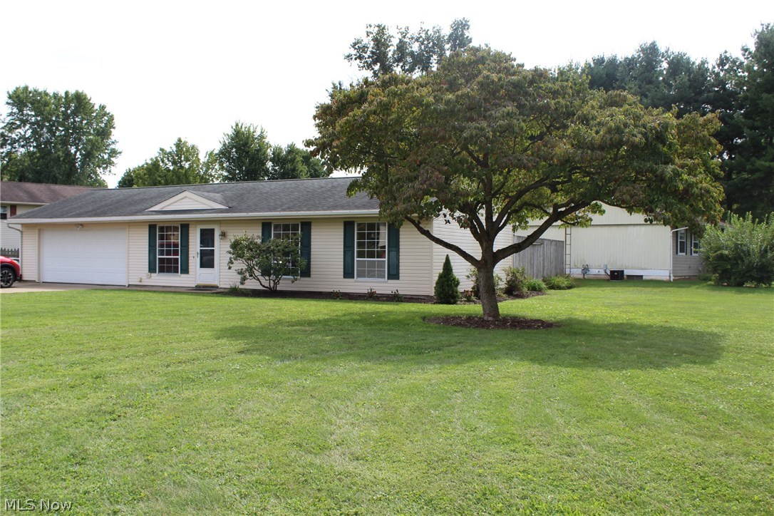 Nice ranch with 3 Bedrooms and 2 car attached garage.  Updated Eat in Kitchen with Hardwood Floors.  Great fenced in back yard with deck to sit and relax on.  Updates include, roof, Kitchen, H2O Tank, and Siding.  Appliances convey including washer and dryer
