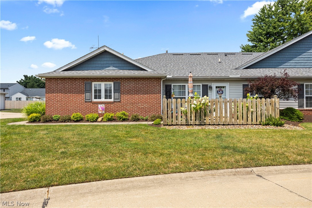 Welcome to 519 Heather Woods Drive in Elyria, a beautifully maintained ranch condo offering comfort, convenience, and effortless living. Located in the heart of Chestnut Heights, this 2-bed, 2-bath ranch features an open, light-filled great room with soaring vaulted ceilings. Freshly painted throughout, with new carpet in both bedrooms, this home is move-in ready. The kitchen includes all appliances and a flanking utility room for added convenience. The primary suite boasts a private bath, walk-in shower, and oversized walk-in closet. Enjoy a private patio, plus a 2-car attached garage with overhead storage. The brick front adds curb appeal, and HOA-covered landscaping and snow removal ensure true carefree living. Minutes from highways, shopping, and dining, this home balances tranquility with convenience. Don't wait, just move in!