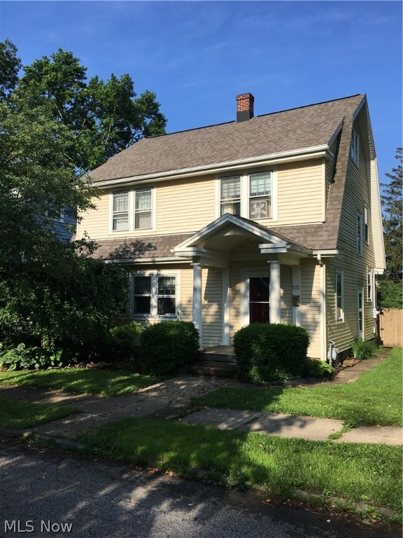 Located one block from the College of Wooster, this charming cape cod offers the perfect blend of history and modern amenities.  With all the beautiful woodwork and hardware still in place the home offers an updated eat in kitchen with stainless steel appliances, spacious living room with mosaic tile fireplace, dining room, sunroom and a half bath complete the main level.  Upstairs there are four bedrooms, an updated bathroom all complemented with lovely built in storage.  The attic features a large finished bonus room.  The private backyard has a wonderful deck for entertaining and the one car garage and carport are located off the back alley for convenient off street parking.  Taxes reflect 2.5% reduction.