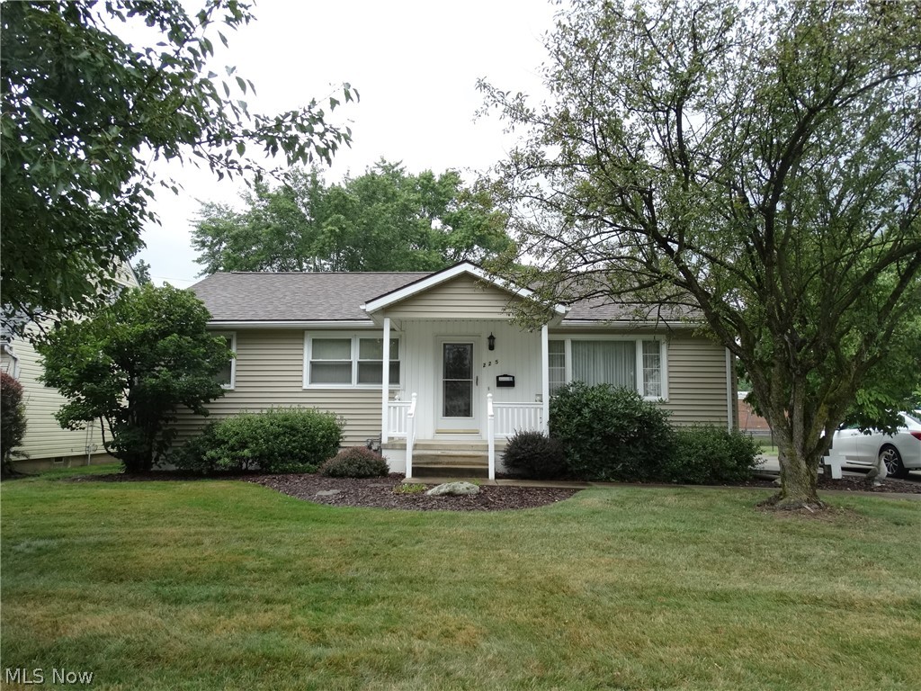 This is an outstanding ranch that has been lovingly cared for throughout the years.  So much to tell you so I will start with the remodeled bath that offers walk in shower and first floor laundry.  The stackable washer and dryer remain.  Charming kitchen with large eating area.  Both spacious living room and Family room areas. Fireplace in family room.  Garage plus concrete drive with ample parking.  I love the rear yard and you will too.  Home updates include:  Roof 2013, furnace and air 2007, windows 1996, glass block windows in basement.  Basement waterproof system 2020 with transferable warranty.  refrigerator 2020.  You will want to be sure to make your appointment to view without delay. Hardwood floors in bedrooms.
