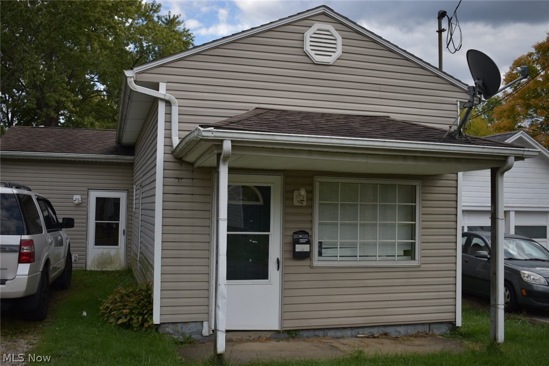 Charming bungalow with close proximity to Ravenna's city center.  1 Bedroom ranch with living room, dining room, Kitchen and full bath with attached laundry. Tax records indicate 2 bedroom and seller states dining room was used as another bedroom with a closet, but would be a walk- through room. Kitchen offers built-in hutch and appliances. Front porch and back patio offer outdoor seating spaces.  Nice size back yard and driveway for parking. Shed on property; can not guarantee it's condition. Have your own home, better than apartment living!