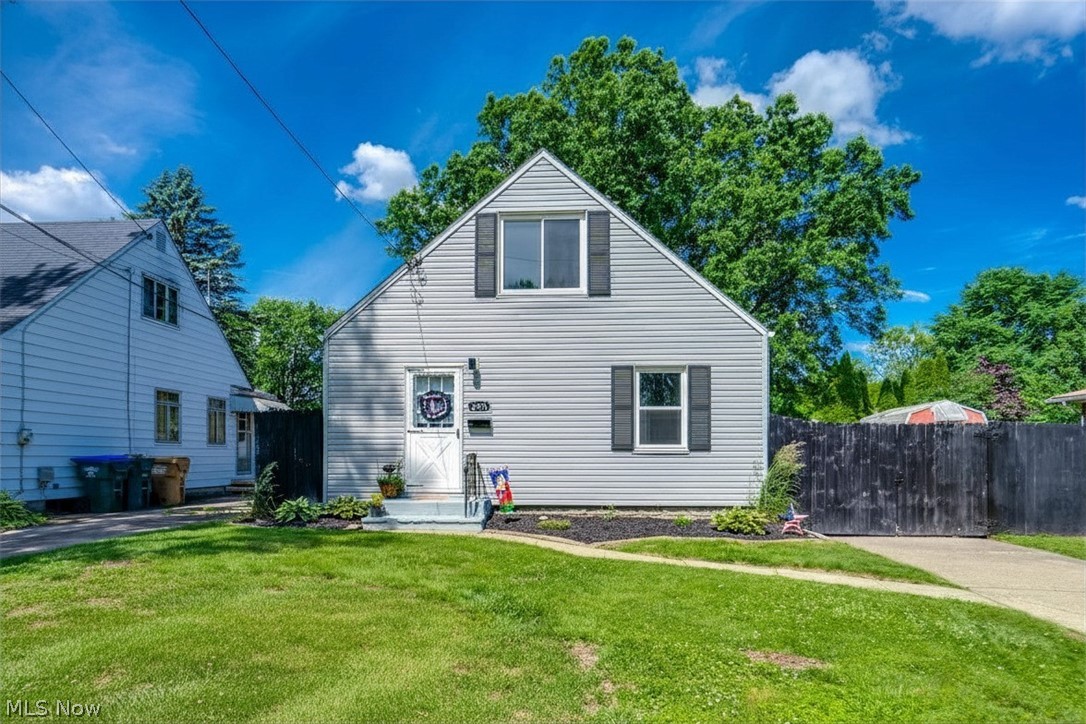 If move-in ready means something to you, this updated Cuyahoga Falls Cape Cod delivers it. The functional two-level layout offers three bedrooms and a fully remodeled bathroom, all touched by a head-to-toe refresh completed in 2020. Step inside to find laminate wood flooring, freshly painted walls, and a kitchen with repainted cabinets, updated hardware, a new countertop, and a deep well sink. The bathroom was fully renovated with onyx black ceramic tile and a modern vanity. Hardwood floors run through both main-floor bedrooms, while the upper-level bedroom is finished with plush carpet. Mechanical updates offer real peace of mind: new furnace, HVAC, vinyl siding, and windows all completed in 2020. The basement adds flexible utility space and houses the laundry. Out back, a fully fenced yard gives you private outdoor space, and a detached one-car garage rounds out the package. Conveniently located in Cuyahoga Falls with easy access to shopping, dining, commuter routes, and everything the area has to offer. Schedule your showing today.