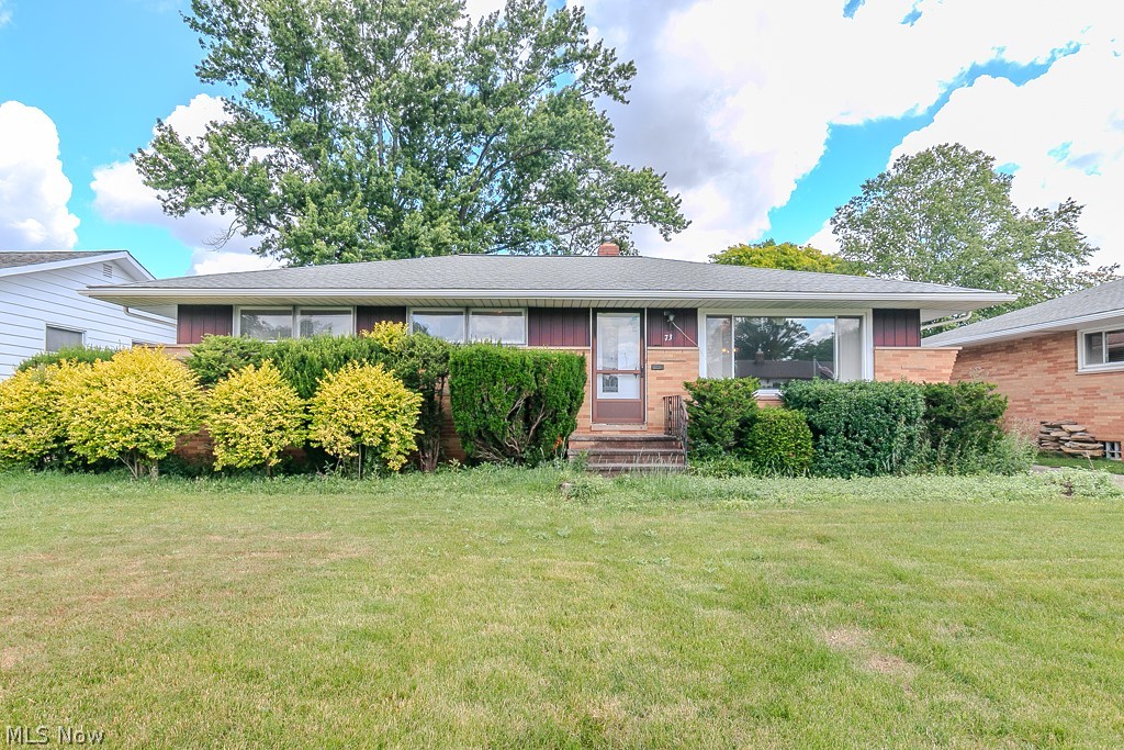 A diamond in the rough in desirable Seven Hills! This 3-bedroom, 1.5-bath ranch offers over 1,200 square feet of comfortable living space with wonderful potential throughout. Original hardwood floors can be found in all three bedrooms, and the seller believes hardwood may also be under the carpet in the living and dining rooms. The spacious L-shaped living and dining room creates an inviting, open feel, with the dining area flowing nicely into the eat-in kitchen. A full bath and convenient half bath, with bedroom access, complete the main level.

The lower level offers additional living space with a finished recreation room, while the unfinished side provides laundry, storage, and plenty of room for future possibilities. Outside, enjoy a large backyard and an oversized two-car detached garage. Additional updates include a newer AC and a new garage door opener. Bring your imagination and finishing touches—this home has the space, layout, and potential to truly make it your own!