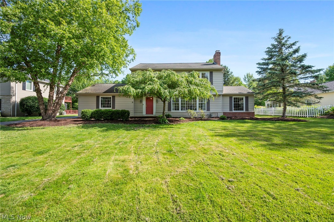 Welcome home to this bright, updated, and move-in ready 4-bedroom, 2.5-bath home in the highly sought-after Aurora School District, conveniently located just minutes from charming downtown Aurora with its shops, restaurants, parks, and community events. Filled with natural light and finished in today's neutral colors, this home offers a clean, inviting feel from the moment you step inside. The spacious living room welcomes you with a fireplace and a wall of windows, creating a warm and airy gathering space. The adjacent dining room flows seamlessly into the kitchen featuring white cabinetry, stone countertops, and stainless steel appliances. The stunning great room is the heart of the home, showcasing vaulted ceilings, a fireplace, and two walls of windows that bring the outdoors in. An additional flex space on the main level can serve as a fourth bedroom, home office, playroom, or second living area. A convenient half bath completes the first floor. Upstairs, the spacious primary suite offers generous closet space and a refreshed en-suite bath. Two additional bedrooms and a full bath provide plenty of room for family and guests. The refinished lower-level recreation room, completed in 2024 following waterproofing, adds valuable living space perfect for a media room, fitness area, playroom, or hobby space. Additional recent improvements include a new HVAC system (2023), fresh paint in select areas, and a Wi-Fi-enabled garage door opener with smartphone access. Outside, enjoy a large backyard with a patio, terraced garden, storage shed, and plenty of green space for entertaining, play, or relaxing. Thoughtfully updated and meticulously maintained, this home combines modern comfort, flexible living spaces, and an unbeatable Aurora location. Schedule your private showing today.