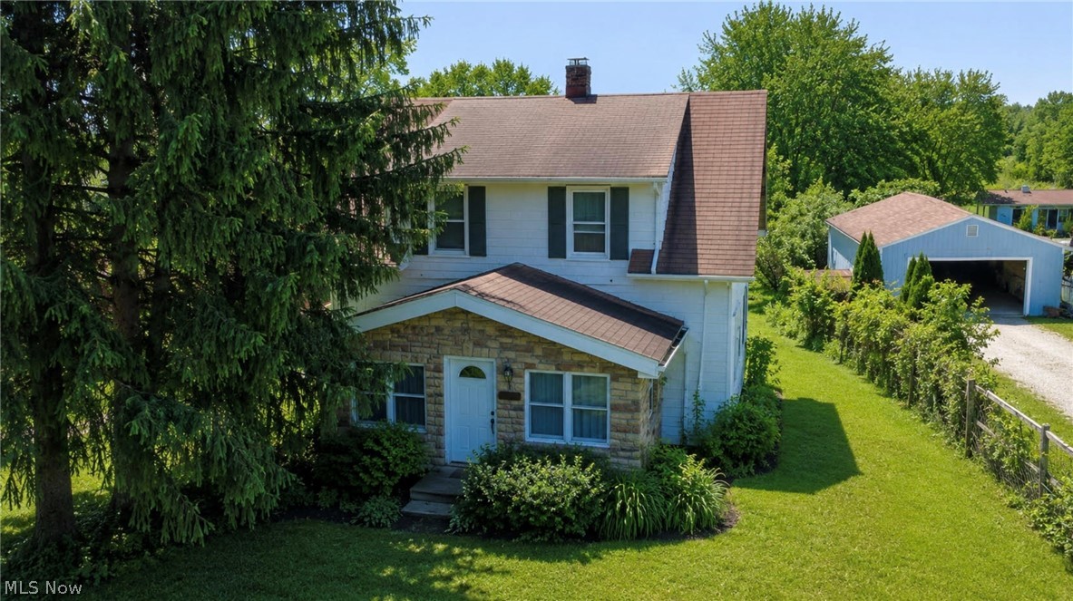 Welcome to this adorable, well-maintained 2-bedroom, 1-bath bungalow located in desirable Boston Heights within the Nordonia Hills City School District! Lovingly owned by the same owner for over 40 years, this charming home is full of character, warmth, and cozy cabin-like charm. Enter through the inviting front sunroom into the cozy living room featuring a beautiful custom-built stone wood-burning fireplace, hardwood floors, and lovely pine walls that make the home feel like a peaceful cabin retreat. New windows were installed throughout the first floor in 2023. The main level also includes a dining room and kitchen, offering a functional and comfortable layout. Upstairs, you’ll find wood flooring throughout, a full bath, spacious primary bedroom, and an additional bedroom. Additional highlights include abundant storage, well pump checked in 2025, new hot water tank (2025), and new sump pump (2025). Don’t miss this charming home filled with timeless character, thoughtful updates, and cozy rustic appeal!