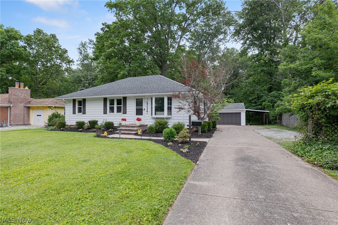 Perfectly located ranch on a large, deep lot! This beautiful home sits in-between I-90 and I-480 and is minutes to both Great Northern and Crocker Park! Walking in, you'll enter into the large living room with gleaming hardwood floors and a large bay window allowing in plenty of natural light. The living room is open to the dining room that will take you into the kitchen with a vaulted ceiling with a skylight, quartz counters, and stainless steel appliances. The first floor includes three nice sized bedrooms and a full bath. Going to the lower level, you'll enter into the huge recreation room! The rec room includes plenty of space to spread out and a cozy bar area. Also in the basement is a large office/ flex room, recently added full bath, and laundry and utility room that has plenty of room for storage. Outside is a huge back yard! The back yard is partially fenced, but don't miss out beyond the fence! The backyard has a nice covered patio off of the two car garage. Updates include furnace, central air and hot water tank in 2018, finished basement 2018, added full bath to basement 2021, washer/ dryer 2022, exterior paint and garage gutters 2024, and sump pump battery 2026.