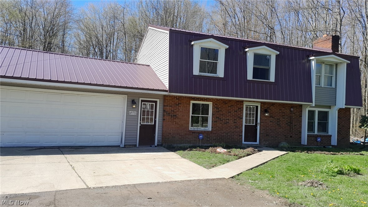 So many possibilities in this 4 bedroom & 2 bath home! Owner has done updates with newer metal roof, newer thermostats, updated electrical within last 5 years. Bladeless and retractable ceiling fans. This home can easily accommodate a family needing an in-law suite too! There are 2 kitchens/1 on each floor!! Not to mention a full bath on each floor as well! Bathroom on main floor and 3 bedrooms up additional living room off the kitchen too! The owner recently purchased a fireplace insert just to keep you extra toasty warm on those extra chilly winter evenings! There are two out buildings situated on this 2.5 acre dwelling! Condition is unknown. This home is just waiting for that special buyer who will have the vision to see all it has to offer.