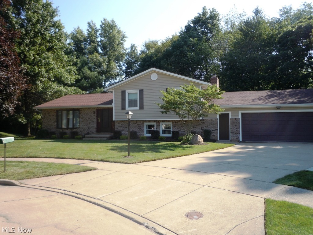 A must See! This is an amazing opportunity for a four bed, 3 bath split at the end of a quiet Cul-de-sac. Beautiful partially wooded lot offers lots of privacy. Many updates including newer windows, newer HVAC, vinyl siding, water proofed basement and much more. This home has been loved and well cared for by the owner. Call today, this one won't last!