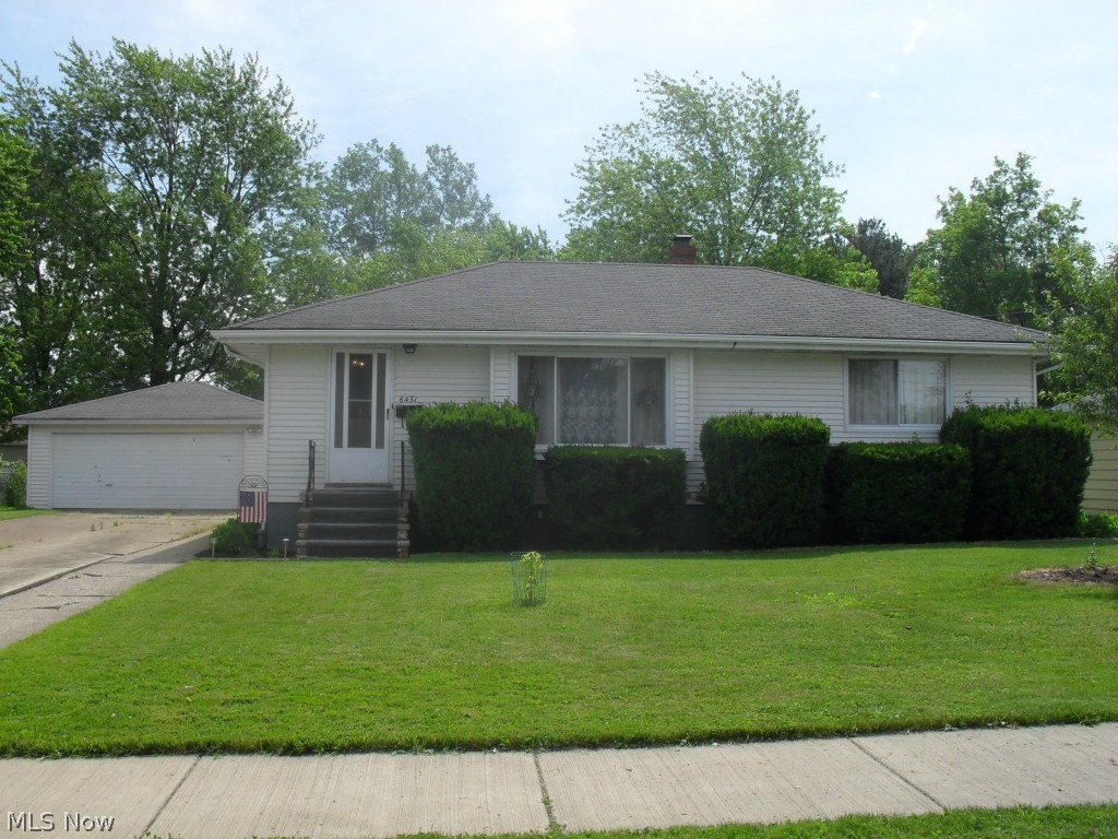 3 Bedroom, 2 Full Bath Ranch with Finished Basement sitting on 1/2 Acre park-like yard! 2 car detached Garage with a covered Carport on the side!  2 Full Baths -main floor and basement. Hardwood Floors throughout and ceiling fans in every room! Vinyl tilt-in windows!  Furnace (2010), Carpet (2010), electrical updated! Home Warranty included.