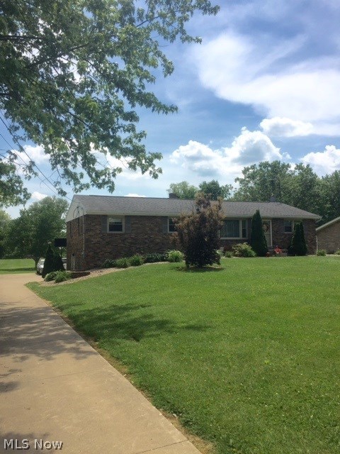 Great location! 3 bedroom & 2 full baths brick home! Tons of Updates including windows, garage doors, exterior doors, furnace, hot water tank, updated electric, well pump & pressure tank. Large lot. 2 car garage. Central air. Great family home! agent owned.