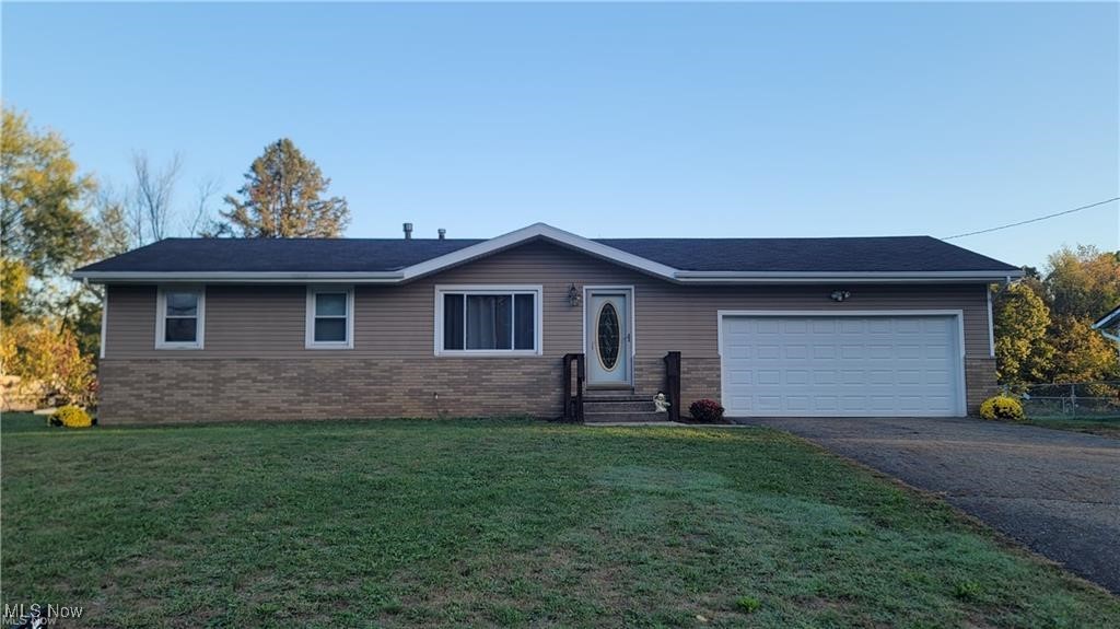 Welcome home to this darling 3 bedroom, 1 full bathroom (with walk in shower) ranch home in Suffield!! Enjoy all new carpet (hard wood flooring underneath in living room, dining room and bedrooms). Huge recreation room with gas fireplace and bonus room (could be 4th bedroom, office, craft room and more)! Enjoy summer evenings and morning coffee on the composite deck with quaint, quiet views of the back yard! Fresh paint. Roof is approximately 10 years old. H20 heater is approximately 5 years old. Just move right on in and enjoy peaceful country living with quick access to 224! Hurry, schedule your showing before it is gone!!!