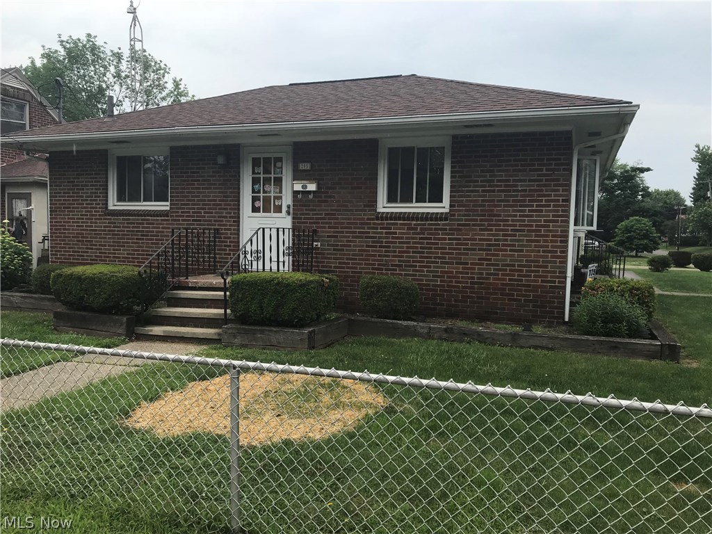Charming 3 bedroom corner lot, brick ranch located close to several amenities. Much larger than it looks! Spacious Living Room w/ fireplace. Large kitchen brings this all together with tons of cabinet space. Appliances negotiable.