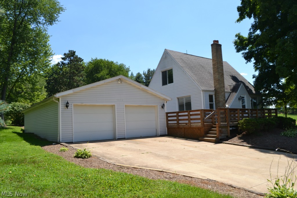 Completely Updated Four Bedroom-Two Bath Home with a FOUR Car Garage on Two Acres in East Canton!  Two Bedrooms on Main Floor and Two Bedrooms on Upper Level.  Full Bath on Each Floor.  Updates in 2015 Include - Two Updated Bathrooms, Designer Look Kitchen Cabinet Finish, Kitchen Flooring, New Stainless Kitchen Appliances including French Door Bottom Freezer Refrigerator, New Carpet in All Bedrooms and Living Areas, Fresh Paint in All Rooms, New Light Fixtures, and Clearing Both Lots!!  HGTV Colors!  Two Acres of Gently Sloping Land - Wonderful Country Feel, But Close to Town!  Central Air.  Huge Screen Porch.  Front Deck With Western View for Amazing Sunsets.  New Well 2012.  Concrete Drive.  And Saving Best for Last...  24 x 40 Detached 4 Car Garage with Three Doors, Two in the Front and One in the Back for ATV's or Lawn Equipment.