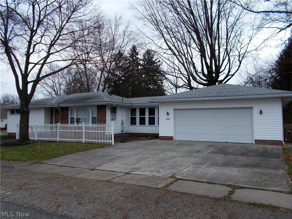 Cuyahoga Falls Ranch close to schools, shopping and minutes to  RT 8.  Nicely maintained with spacious applianced kitchen and a sunny morning room eating area.  Large master with double closet and 2 more bedrooms with beautiful hardwood oak floors.  The living room will accomodate a sectional sofa with ease. The partially finished basement feature a rec rom with bar, pool room (the pool table and accessories stay).  Updated furnace. Some newer windows. The knotty pine breezeway with convenient half bath  attaches to the 23 x 40  4 car garage w/opener and workbench.  This home is dated with lots of wallpaper and carpet.