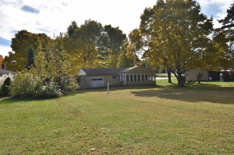 Rare find on this 2 bedroom/ 1 bath water front cabin the the Atwood Valley community at Atwood Lake on a flat 100x100 lot. This is on private land saving you over $4000 per year compared to a leased lake front lot and very affordable taxes. A ton of potential awaits the new owner ready to apply their updating skills. Open format living room, dining area and kitchen with a brick fireplace. A spacious enclosed/ screened porch will be loved by family & friends while enjoying the wonderful lake views. Docking rights are available within the Atwood Valley docking association subject to availability. The home offers a one car attached garage with a garage door on each side & a carport which serves as a great area for winter boat storage. The Atwood Lake Marina West is directly across the lake offering a great location to cruise over for dinner or boating and fishing supplies. Now is the perfect time to take advantage of this affordable waterfront cabin and let the family memories begin. Mos
