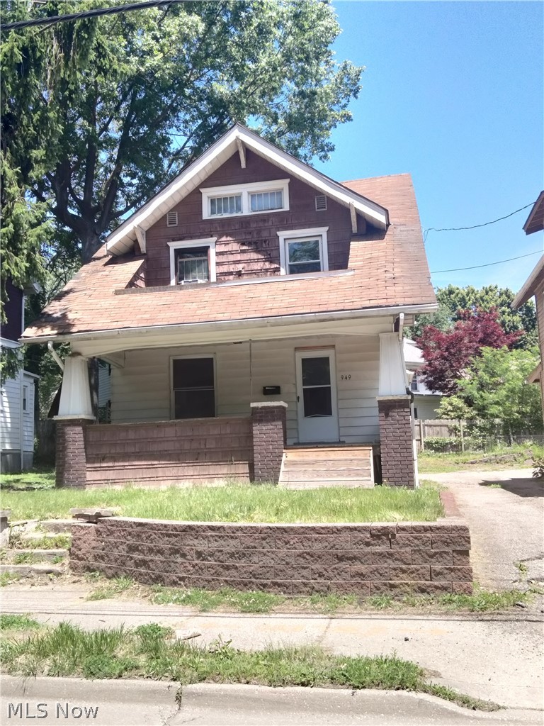 Perfect starter home or investment property. This home is located three blocks from the center of Highland Square where fresh groceries, drugstores, and banks are found along with many restaurants and taverns, a theatre, post office, and quality learning centers. The home is a two and half level three bedroom with a finished third floor. There are hardwood floors throughout. Three bedrooms are located on the second floor. One of the bedrooms has a "bonus room" attached with tons of windows. Perfect for a home office or play/gaming room! A full bathroom is on the second floor. Heated by a newer gas forced air furnace, the house does have many new windows. Clothes washing machine hookups are in the full large basement with plenty of storage. The house has a front porch, a very small front lawn and rear area for parking with a shared driveway. Call or click to schedule your showing today!