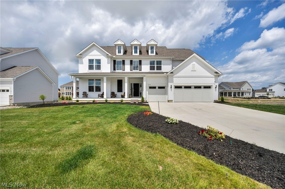 From its show-stopping curb appeal to every thoughtfully designed space within this stunning one year old custom home effortlessly blends timeless elegance with modern functionality. A covered front porch welcomes you into the two-story foyer. At the heart of the home is a chef's kitchen designed to impress. Cabinetry reaches the ceiling with glass-front upper displays while an island anchors the space & is perfect for gatherings. It is perfection with a herringbone tile backsplash, stainless appliances, gas cooktop, & double ovens. The stunning kitchen also features a fully appointed scullery with custom cabinetry, second refrigerator, dishwasher, pantry & ample prep & storage space. The dining space is wrapped in windows filling the room with natural light & opens into the covered back porch making indoor-outdoor entertaining seamless. The family room is open from the kitchen featuring a fireplace & abundance of natural light. The two-level home office provides a bonus space for a peaceful sitting room. Also on the first floor are a laundry room & garage entry into a mud room area with a walk-in coat closet & another pantry. Upstairs are five bedrooms, four full bathrooms, & a loft living space. The primary suite is a true retreat including a sitting area, bathroom with dual sinks, soaking tub, walk-in shower, & large walk-in closet. Each of the other bedrooms are generously sized & have dedicated full bathrooms. The fabulous finished basement adds more space for entertaining, relaxing, or exercising & includes another full bathroom, storage rooms, & egress window. With a 3-car attached garage, dual zoned HVAC system, hardwired security system & cameras, hardwired Eero mesh system & ethernet ports, professional landscaping & irrigation system, & lighting upgrades throughout, not a single detail has been missed. Enjoy life in the highly sought after Legacy Isle golf community with a pool right across the street, golf course, clubhouse, driving range, & restaurant.