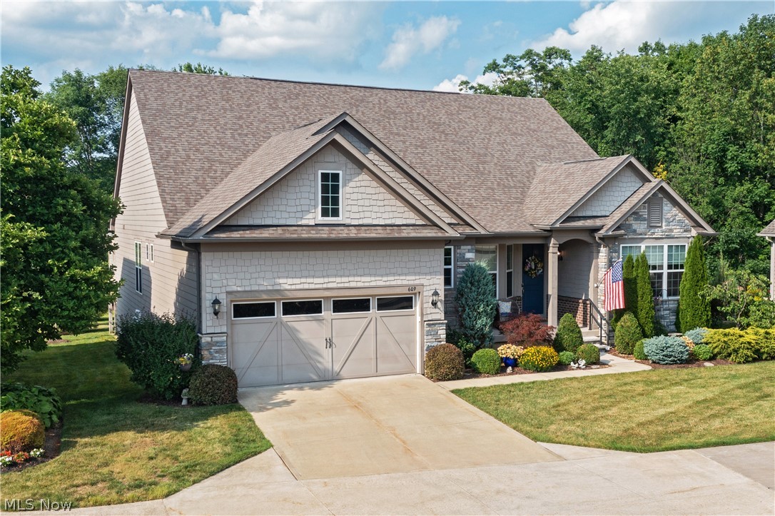 Luxury, comfort, and effortless living come together in this exceptional Cape Cod located within the gated Clubside Manor enclave of Barrington. Built in 2018 and thoughtfully designed for today's lifestyle, this beautifully appointed home offers the rare combination of elegant finishes, a functional floor plan, and the convenience of maintenance-free living in one of Aurora's most desirable communities. At the heart of the home is a spacious, open-concept layout that flows seamlessly from room to room, creating an inviting environment for both everyday living and entertaining. The well-equipped kitchen features granite countertops, premium stainless steel appliances, and casual seating, all opening to comfortable gathering spaces designed to keep family and guests connected. A sun-filled living area, family room with fireplace and beverage bar, formal dining room, and bright sunroom overlooking the professionally landscaped backyard provide multiple settings for relaxing, hosting, and enjoying the home throughout every season. The first-floor owner's suite serves as a private retreat, complete with a luxurious bath, expansive walk-in closet, and dedicated laundry access. A second main-level bedroom suite offers flexibility for guests, while a private office creates an ideal work-from-home environment. Upstairs, a secluded living suite with its own sitting area, bedroom, office nook, and storage provides exceptional privacy and versatility. The finished lower level expands the home's livability even further, offering an expansive recreation and entertaining space with daylight windows and a full bath. Beyond the home itself, residents enjoy the unparalleled lifestyle that Barrington is known for: gated security, beautifully maintained grounds, scenic walking paths, and scenic golf course surroundings. Here, luxury is defined not only by beautiful spaces, but by the freedom to spend less time on maintenance and more time enjoying the things that matter most.