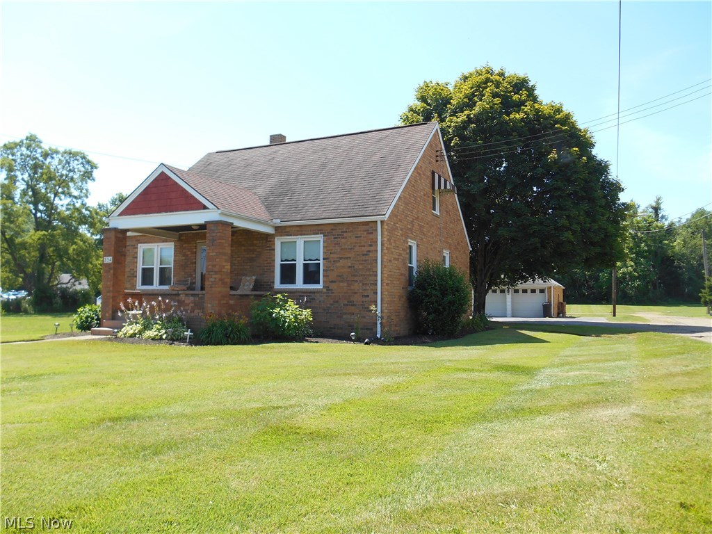 Fantastic, all brick 3 bedroom home sitting on .72 acre lot in the heart of Waynesburg. The main level features a large living room with beautiful hardwood flooring, an eat in kitchen with plenty of cabinet and counter top space, 2 big bedrooms and a full bathroom. Upstairs has a huge 3rd bedroom with closet and storage space throughout. The basement is partially finished having a carpeted rec room with fireplace adding an additional 544 sq. ft. of living space. Other features include newer vinyl windows, newer roof, relaxing back deck overlooking the huge back yard, 2 car garage with openers and more. One of the extra lots includes a foundation in place with public water and sewer that's ready to build your dream garage or has many possibilities. Close to parks, walking path, playgrounds, and schools.