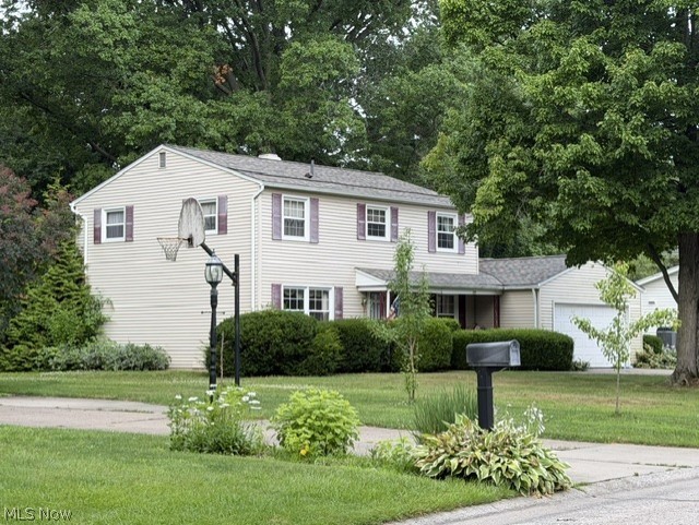 Very well-maintained home in a beautiful neighborhood! Built to last, home has built-in wood shelves, that were built by Virgil's in N. Ridgeville, in the family room for all of your stuff, including a pull down area for the computer. There is a formal dining room; a large, separate living room; all rooms are generously sized and ready for your furniture; first floor laundry and 1/2 bath; nice basement for extra room or storage; home also has a spacious back yard. Brand new roof installed July, 2026. This all sits on a little over a half-acreage. This home is a one homeowner home since it was built. Call today for your personal showing.