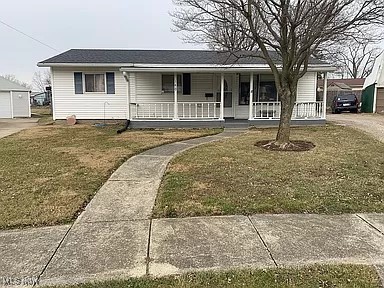 Welcome to this charming, updated three possible 4-bedroom, one full bath ranch home on a cul-de-sac street and is in the heart Bellevue. This property sits on a generous lot. The home presents a great opportunity for first time home buyers looking to build equity in this established neighborhood. Come on in from the front covered porch to the living room, and open to the kitchen. New flooring and recently painted, and new light fixtures throughout the home. The bright, large eat in kitchen offers new white cabinets, new countertops, range and ceiling fan. Full bathroom offers all new tub surround, vanity, lights, sink and faucet. There is a large barn-style garage and a shared driveway, adding functional outdoor space and parking. All you have to do is move right in and add your personal touches.