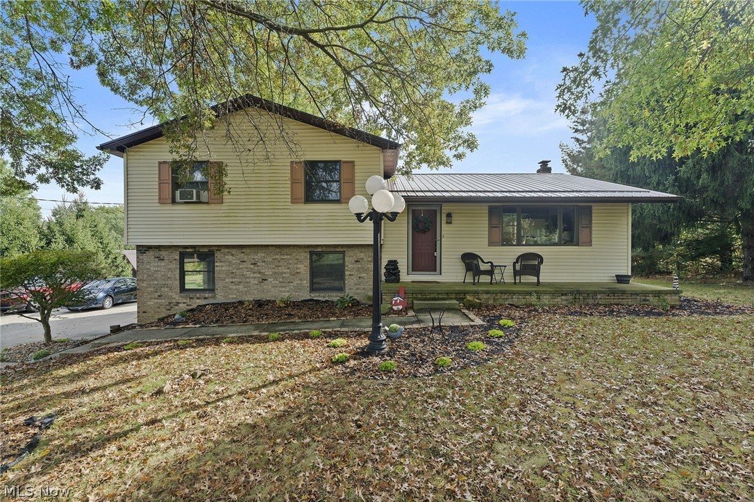 Escape to tranquility with this beautiful property offering breathtaking views and 1.57 acres of outdoor space to relax, unwind, and enjoy nature. Whether you're sipping coffee on the front porch or lounging on the back deck, serenity surrounds you.

Inside, you'll find thoughtful updates throughout, including fresh paint, updated cabinetry, and a stunning newly added fireplace with custom shelving that creates a cozy focal point in the living room. The spacious open-concept layout is perfect for both everyday living and entertaining guests.

The finished basement adds valuable extra living space, ideal for a family room, home office, or recreation area. Highlights include:

Durable metal roof
Newly installed radon mitigation system (2024)
Expansive open floor plan
Finished basement for added versatility

Don’t miss your opportunity to own this peaceful slice of the countryside. Schedule your private showing today!