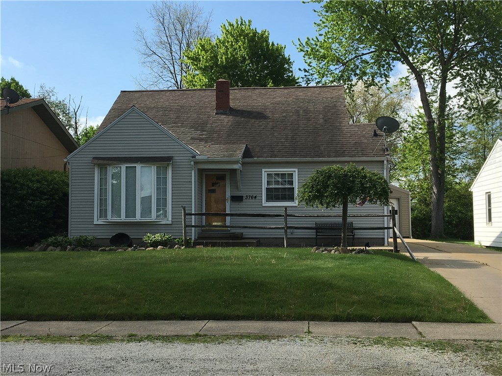 Seller welcomes backup offers. This one-of-a-kind beauty offers 4 bedrooms, 2 full baths with major upgrades throughout and numerous fun amenities for any family to enjoy. Three-section outbuilding measures 8'x8', 10'x16', and 15'x8' simply great for extra storage and multiple hobbies was built in 2008. Easy to entertain in the private fenced backyard complete with a 15' x 16' wood deck, concrete 24' x 8' area, plus 25' x 8' brick patio, all vinyl covered to keep the rain out, all with overhead lighting. A fun peak-a-boo play area for children with hall study area upstairs.  Nice features include living room large bay window, spacious counter space and handy breakfast bar in kitchen, cast iron bathtub and stone walls, newer floorings throughout, 9' long closets, modern light fixtures, décor to appreciate, central air, glass block, and a ready-to-go fire pit in the manicured landscaped lawn with a raspberry/blackberry bush area. The beautifully finished lower level 29' x 11' extra livin