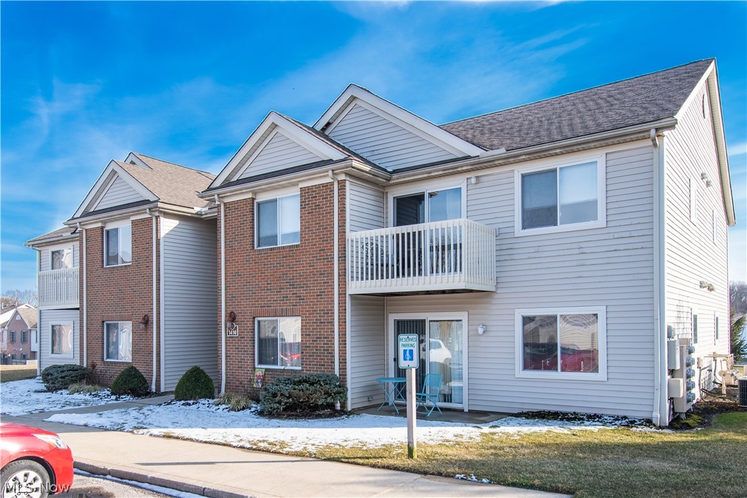 WELCOME TO 1414 Buckingham Gate Blvd.,

This truly *MOVE-IN READY*  Updated & affordable second floor condo is conveniently located in the desirable Brookledge Commons development with a pool, clubhouse, off street parking, and private garage. The welcoming front entrance opens to the bright and spacious and open living room with neutral decor & vaulted ceilings. The adjacent kitchen is complete with luxury vinyl tile flooring, stainless steel appliances, updated lighting & cabinet fixtures, beautiful granite & backsplash and a sizable breakfast bar overlooking the dining area & sliding glass doors to a personal balcony. The full bathroom offers an updated vanity, luxury vinyl flooring, light fixture & mirror/towel bars. The sizable master bedroom offers oversized windows and a large 5' x 7' walk-in closet. Additional features/improvements include: a laundry/utility room with updated flooring and washer/dryer, newer carpeting throughout and a 1 car detached private garage with electr