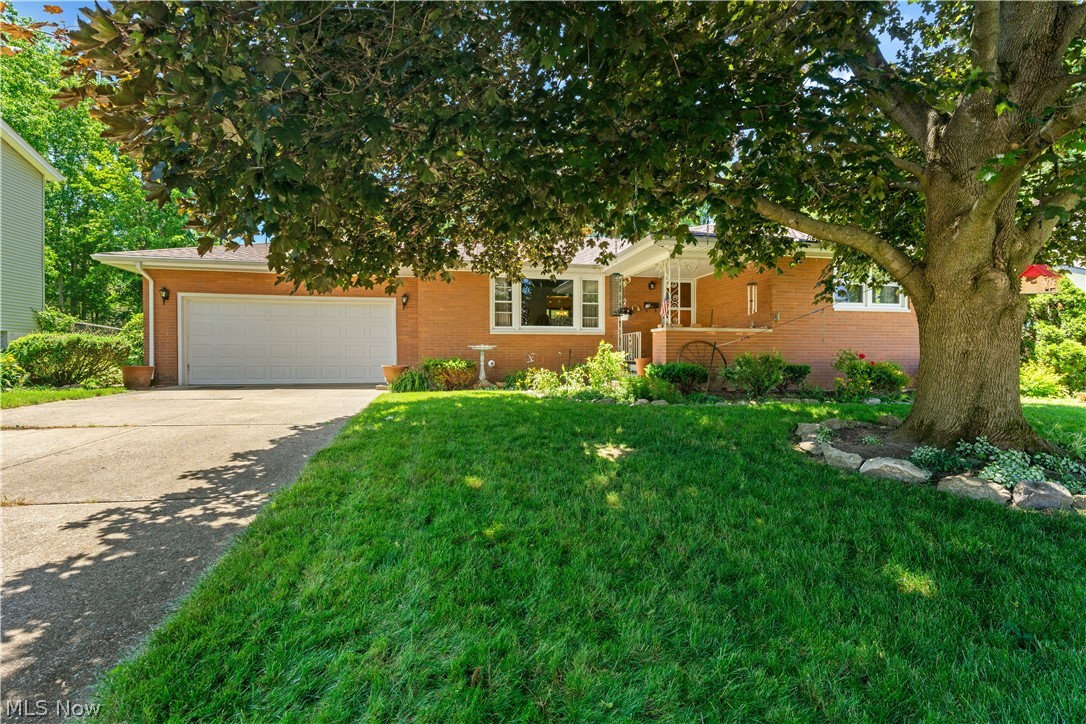 Yard space abounds at this lovely ranch in the Boardman school district. You’ll have plenty of room to lay in the sun, start that garden you’ve been dreaming of, or let the kids and pets out to play with the safety and privacy of a fully fenced in backyard. Step inside and you’ll find a gorgeously updated kitchen with ceramic floors and newer kitchen appliances. This sprawling brick ranch offers 3 bedrooms and a large full bath. Can’t get enough of the outdoors? This home also features a large sun porch on the back! A 2 car attached garage and a full basement give lots of space for storage or whatever you like! The basement also features an additional full bath. With hardwood floors under the carpet, just add some fresh paint and you’ll feel right at home! Start packing, you’ve found the one!