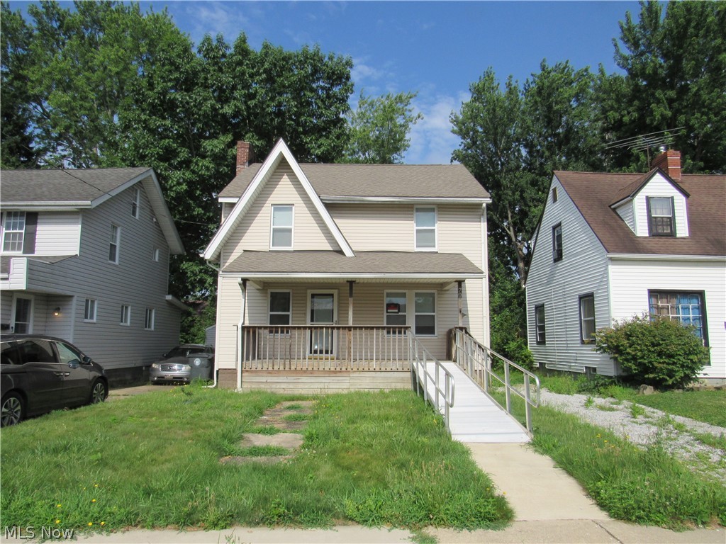 Welcome home to this spacious and well-maintained 3-bedroom, 2 full bath home offering a wonderful combination of character and modern updates. The low-maintenance exterior features vinyl siding, vinyl replacement windows, and a handicap-accessible front ramp for added convenience. Inside, you'll appreciate the inviting living room highlighted by a beautiful fireplace and classic built-in cabinetry that adds warmth and charm. The oversized kitchen is the heart of the home, offering an abundance of cabinet and counter space along with a breakfast bar that's perfect for casual dining, entertaining, or meal preparation.

The first floor also features a full bathroom combined with a convenient laundry area, making everyday living even easier. Upstairs, you'll find three generously sized bedrooms and a beautifully updated full bathroom with modern finishes. Need additional space? The walk-up third floor is unfinished and provides an excellent opportunity for future expansion, additional storage, or the potential to create extra living space.

Whether you're looking for your first home or simply want a property with room to grow, this home offers exceptional value. Conveniently located near shopping, restaurants, parks, schools, and major highways, it combines classic charm with modern conveniences. Don't miss your opportunity to make this move-in-ready home your own!