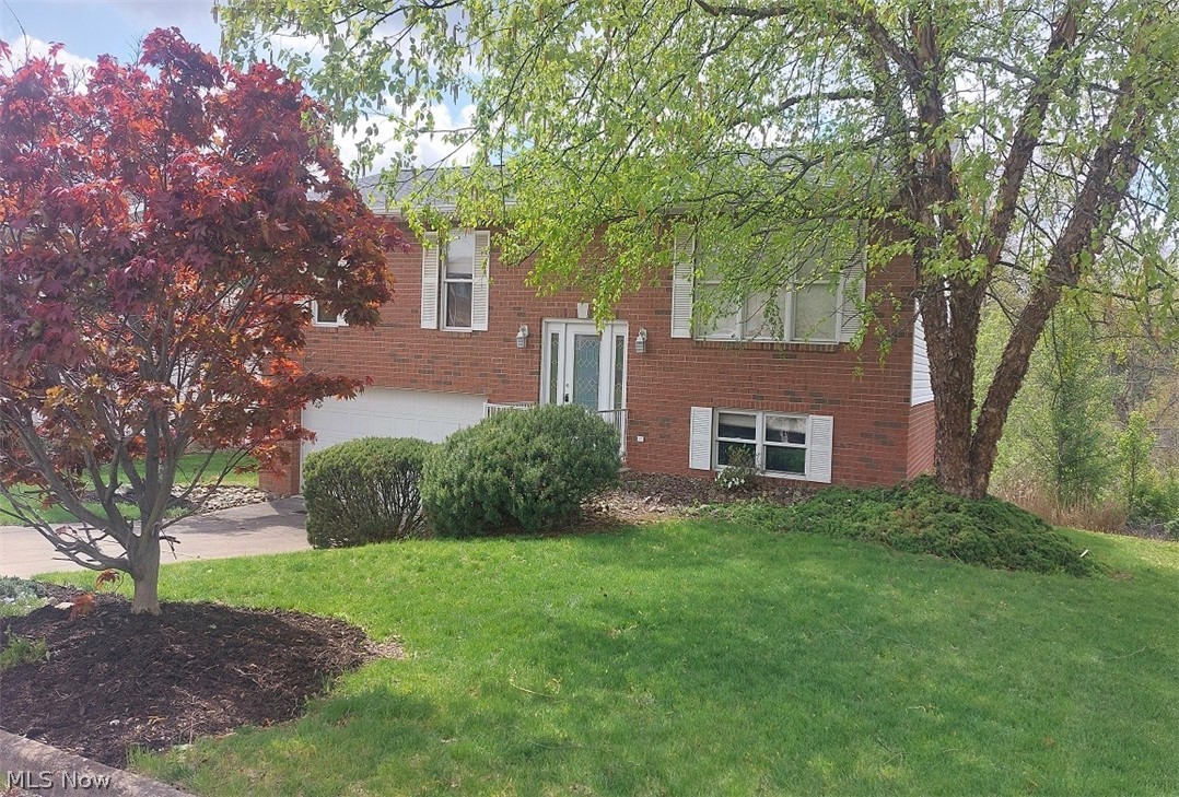 Refined Split-Entry Residence in Steubenville’s Prestigious West End. Experience elevated living in this beautifully appointed 3-bedroom split-entry home, where classic design meets modern comfort. Showcasing a striking brick and vinyl exterior, this residence offers timeless elegance in one of Steubenville’s most desirable neighborhoods. Distinguished Features:3 generously sized bedrooms designed for comfort and privacy 2½ well-appointed bathrooms with refined finishes. Expansive recreation room – ideal for entertaining, media, or a private retreat with a Thoughtfully designed layout and a seamless flow of abundant natural light. Perfectly situated in the coveted west end of Steubenville, you’ll enjoy convenient access to shopping, dining, and everyday essentials while residing in a quiet, established neighborhood. A rare opportunity to own a home that blends sophistication, space, and location. Schedule your private tour today and discover the lifestyle this exceptional property has to offer.
