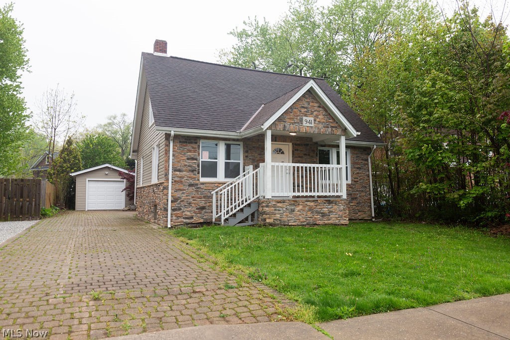 Welcome to 941 Owego Street in Painesville, a thoughtfully updated two-story home offering a blend of modern improvements, functional living space, and inviting outdoor amenities. Recent updates throughout the home include replacement windows, updated interior doors, fresh paint, and upgraded flooring featuring durable tile and newer carpeting in the bedrooms. The home offers two fully renovated bathrooms, conveniently located on both the main and second levels.

The remodeled kitchen has been enhanced with cherry cabinetry, granite countertops, updated fixtures, and ample workspace, creating a practical and attractive gathering area for everyday living and entertaining. Mechanical improvements include a newer furnace and central air conditioning system, helping provide year-round comfort and efficiency.

Outside, the backyard has been designed for entertaining and relaxation with a paver patio area and built-in firepit, offering additional outdoor living space for gatherings with family and friends. With a combination of interior upgrades, updated mechanicals, and outdoor improvements, this move-in-ready home presents an excellent opportunity in a convenient Painesville location.