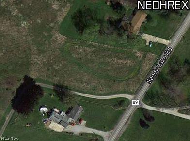 Beautiful, clear, flat lot already perk tested and approved [septic approved by Portage Co.] Just over 1.5 acres and is ready for you to build your residential home! This is in BRIMFIELD Township and FIELD SCHOOL DISTRICT. Driveway has an egress / ingress for home located to left of this property and can also be utilized for your driveway as well, if you desire, place your home further back as an easy inexpensive side load garage!  Approved for single family home. [not multiple unit home].