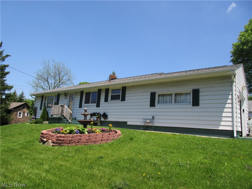 Move in ready 3 bedroom 2 bath ranch.  Over 1500 square feet living space includes large living room and recreation room, generously sized bedrooms and eat in kitchen.  Full basement provides plenty of storage space.  Recent updates include most window, deck and kitchen counters & flooring.  An attached garage, central air and low maintenance exterior complete this great value!
