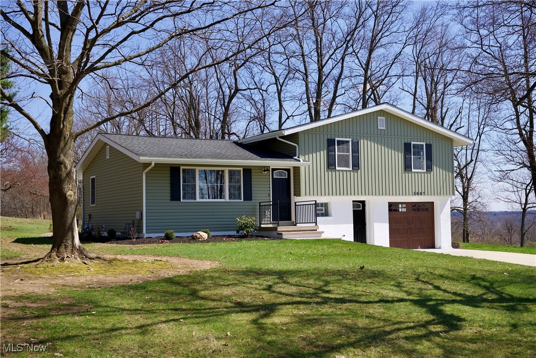 BETTER THAN NEW!!!   This 3 BR/3 BTH home has been COMPLETELY renovated using quality materials & workmanship throughout!!!
All new windows and doors inside & out--New Kitchen with breakfast bar opening to Living room---New stainless-steel appliances & quartz countertops with KraftMaid cabinets.  New 96% efficient HVAC system & hot water tank---New vinyl siding with insulated walls & ceilings---New Whirlpool washer & gas dryer---New vented soffit & gable vents--gutter & downspouts.  Other improvement including lighted closets with lighting and adjustable shelving---New 200 amp electrical service including outdoor service---New well pump, pressure tank &water softener.  There are many more things to love including a new concrete patio, landscaping, mulch and storage barn.....make your appointment today!!!