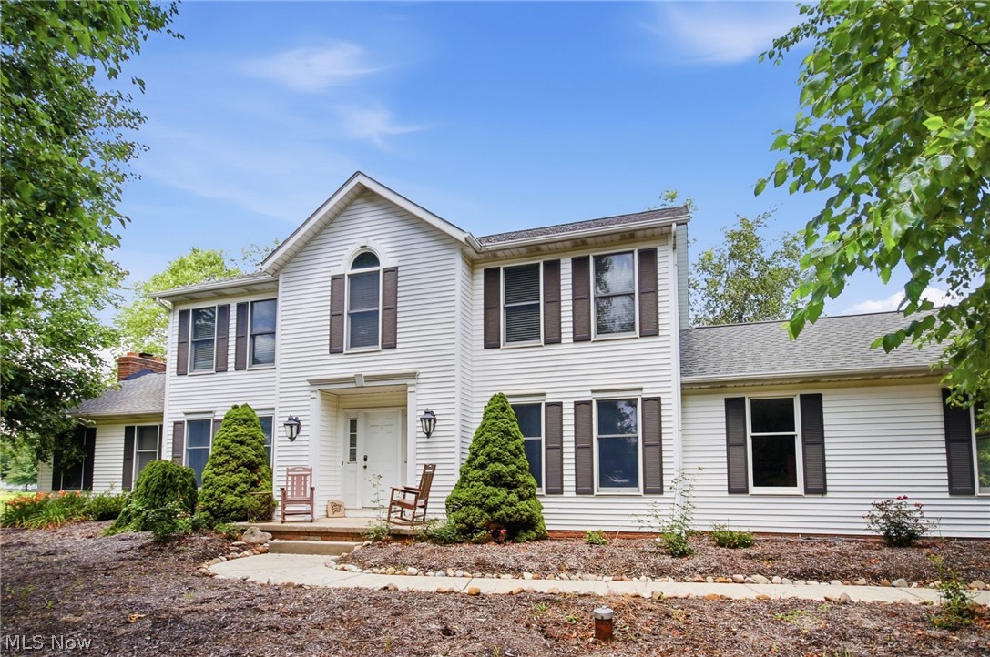Don't miss this rare opportunity to own a beautifully updated, custom Amish-built home on 3.1 scenic acres in the highly sought-after Highland School District. Opportunities like this don't come along often—this is currently the only home available in Highland Schools offering this much land and living space! From the moment you arrive, you'll appreciate the quality craftsmanship and thoughtful updates throughout. The entire home has been freshly painted and features LifeProof 22-mil luxury flooring that's pet and scratch resistant, all new light fixtures, stylish ceiling fans, and a new sump pump (2024) for added peace of mind. Inside, you'll find an inviting living room, formal dining room, and a dramatic vaulted great room featuring skylights and a brick fireplace. The beautifully remodeled kitchen is the heart of the home with soft-close cabinetry, granite countertops, and an elegant stone backsplash. Enjoy peaceful mornings and relaxing evenings on the spacious screened-in porch overlooking your private backyard and picturesque acreage. Upstairs, the owner's suite offers vaulted ceilings, a walk-in closet, and a private bath with soaking tub. 
Need extra space? The versatile bonus room off the first-floor laundry is perfect for a home office, hobby or craft room, reading nook, playroom, pet room, home gym, or even a convenient mudroom/drop zone. A three-car garage and unfinished basement provide plenty of room for vehicles, storage, or future expansion. Additional highlights include city water and a newer furnace.
If you've been searching for space, privacy, and modern updates without giving up convenience, this home checks every box. Homes like this are few and far between—schedule your private showing before someone else calls it home!