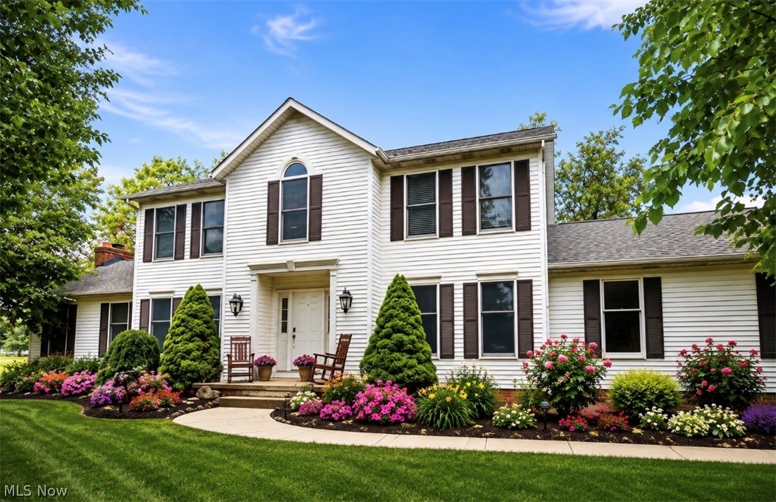 Don't miss this rare opportunity to own a beautifully updated, custom Amish-built home on 3.1 scenic acres in the highly sought-after Highland School District. Opportunities like this don't come along often—this is currently the only home available in Highland Schools offering this much land and living space! From the moment you arrive, you'll appreciate the quality craftsmanship and thoughtful updates throughout. The entire home has been freshly painted and features LifeProof 22-mil luxury flooring that's pet and scratch resistant, all new light fixtures, stylish ceiling fans, and a new sump pump (2024) for added peace of mind. Inside, you'll find an inviting living room, formal dining room, and a dramatic vaulted great room featuring skylights and a brick fireplace. The beautifully remodeled kitchen is the heart of the home with soft-close cabinetry, granite countertops, and an elegant stone backsplash. Enjoy peaceful mornings and relaxing evenings on the spacious screened-in porch overlooking your private backyard and picturesque acreage. Upstairs, the owner's suite offers vaulted ceilings, a walk-in closet, and a private bath with soaking tub. 
Need extra space? The versatile bonus room off the first-floor laundry is perfect for a home office, hobby or craft room, reading nook, playroom, pet room, home gym, or even a convenient mudroom/drop zone. A three-car garage and unfinished basement provide plenty of room for vehicles, storage, or future expansion. Additional highlights include city water and a newer furnace.
If you've been searching for space, privacy, and modern updates without giving up convenience, this home checks every box. Homes like this are few and far between—schedule your private showing before someone else calls it home! Home warranty provided!!