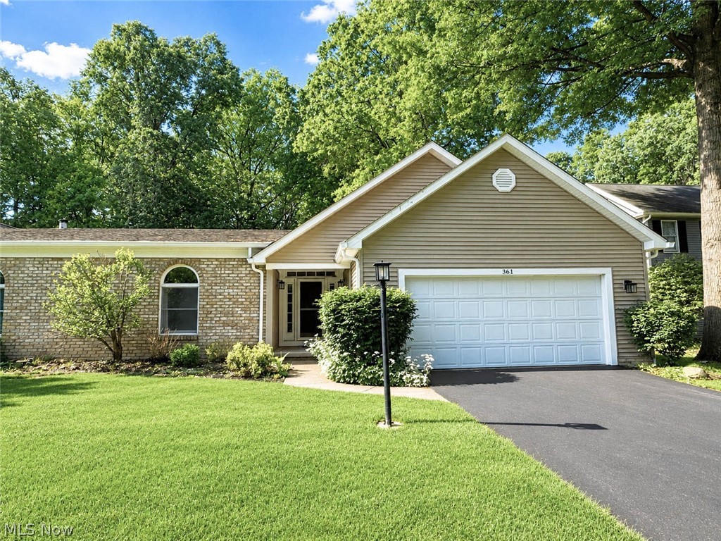 MULTIPLE OFFER SITUATION. AGENTS SEE REMARKS! Fantastic condominium home, in a highly desirable Canfield neighborhood, close to shopping and restaurants! Step into a formal foyer that opens to a spacious great room, seamlessly combining living & dining areas. Take in the stunning, floor-to-cathedral ceiling brick fireplace! Enjoy cooking in the large oak kitchen with cozy eat-in area. The luxurious primary suite features a large private bath, along with a generous walk-in closet plus a double closet for plenty of storage space. The secondary bedroom has convenient access to another full bath, right across the hallway. For added convenience, there is a first floor laundry. All appliances stay with home. In the basement, you'll find a large recreation room, utility room, half bath, and additional storage space. Two car garage. Updates 2025/2026: vinyl siding; electrical; & plumbing. Repairs were also made to drywall and fireplace. Entire first floor freshly painted. Carrier Furnace (2015); Roof (2011) Sump Pump (2020); and Washer (2023).
