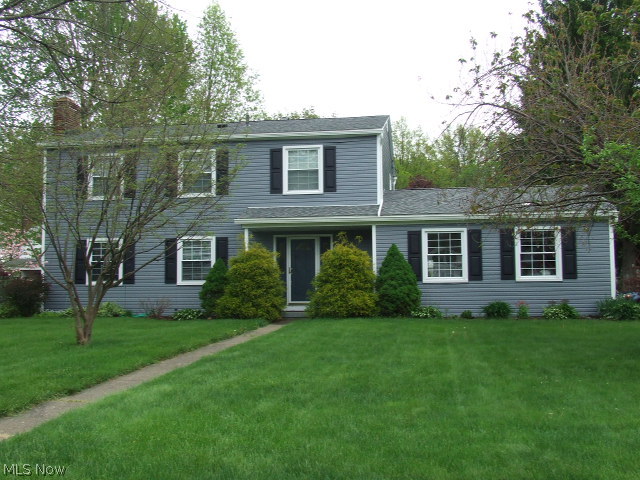 Great 4BR/2.5BA Colonial with huge eat-in Kitchen with oak cupboards, formal Dining room with doggy door and sliders to deck, large fireplaced Living room, and fantastic Great room with cathedral ceiling, skylights and another set of doors to deck.  Extras include master bath, whole house fan, attached 2-car garage with h/c water, composite deck off the great room.  Updates in last 10 years include siding, roof, H2O (1 yr), furnace (8 yrs), deck, winds (9? yrs).  New main bath surround and closet doors.  Finished basement has 2 sections for possible bedroom or office and rec room.  Corner lot.  Home Warranty.  Make this your new HOME!